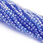 pärlor-glas-blå-regnbågslyster-6mm.jpg