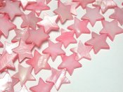 Stjärna i starkt rosa snäckskal